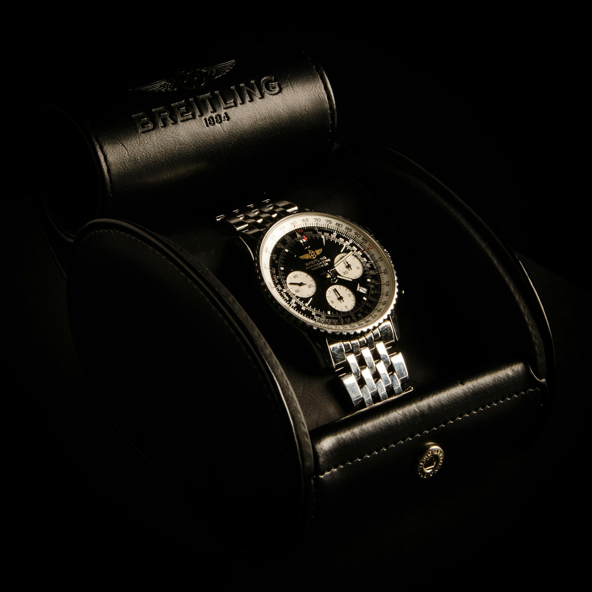 High-end Breitling chronograph watch displayed in a sleek leather case, embodying luxury and precision.
